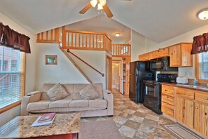 Open concept cabin with futon sofa