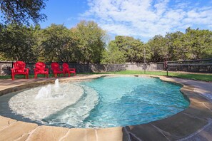 Community pool with loungers