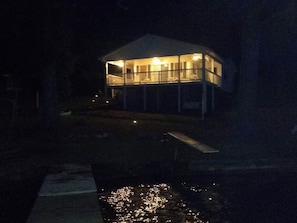 View of the home from the lake at night!