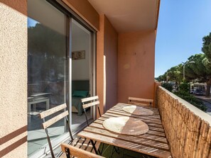 Wood, Shade, Interior Design, Building, Floor, Tree, Sky, Flooring, Real Estate, Plant