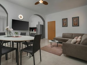 Room, Furniture, Interior Design, Property, Living Room, Ceiling, Floor, Table, Coffee Table, Building