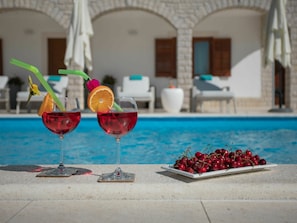 Water, Property, Tableware, Table, Stemware, Azure, Window, Drinkware, Plant, Chair