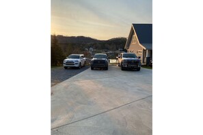 Enough parking for 3 vehicles if you park one in the gravel area.