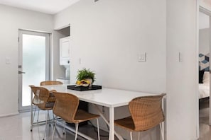 The dining table has seating for 5