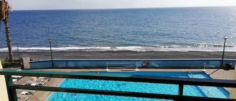 Balcony with Pool & Beach View