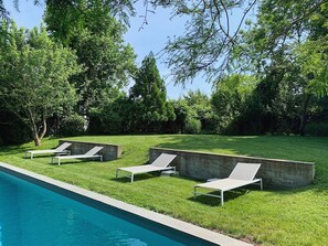 Backyard, some of the lounge chairs