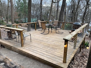 Deck area w/fire pit, table and chairs