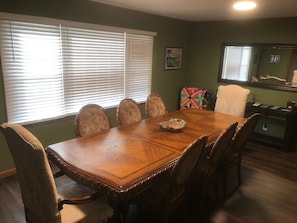 The dining room table can seat 10 or more