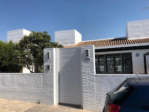 Secure door to front garden.