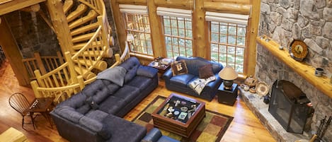 Living room w/ fireplace. Queen pull out couch.