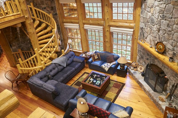 Living room w/ fireplace. Queen pull out couch.