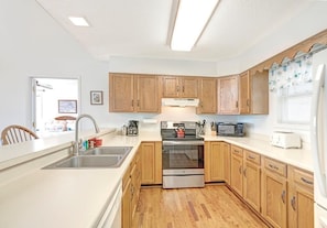 Kitchen--- Spacious with Plenty of Cabinet Space 