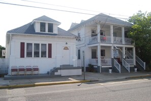 304 East Juniper front of listing house with red shutters and small porch