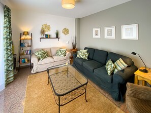 Living room with a large, cozy sitting area