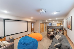 Relax in the evenings as you stream your favorite movies on the big screen. Twin bunk beds for the kids!