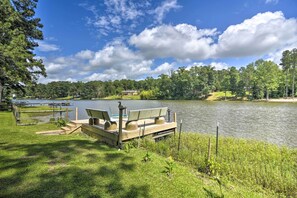 The home sits right on Oldhams Lake and boasts a sitting dock.