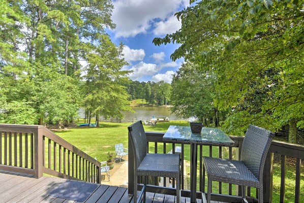 Escape to the forest and stay at this Sanford vacation rental house.