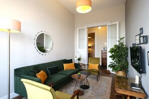 Very comfortable living space with large sofa, 2 armchairs and bar table overlooking the lovely sea views. Enjoy the smart TV here or a drink watching life on the Bosphorus below.