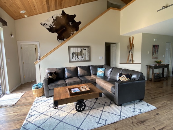 The cozy living room is perfect to unwind after a day of playing outdoors.
