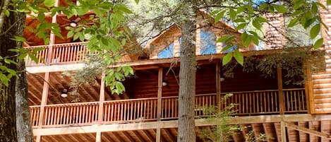 Front of cabin facing river w/ wrap around porch.  Perfect for viewing wildlife.