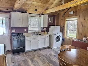 Kitchen with dishwasher and washing machine