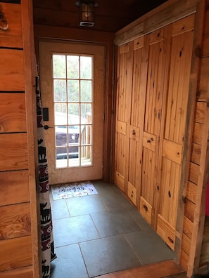 Front door and laundry closet