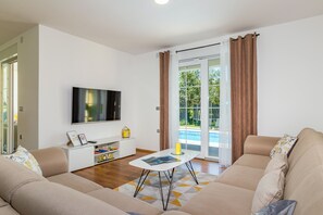 living room with pool view