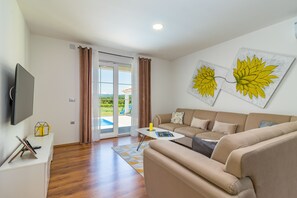 living room with pool view