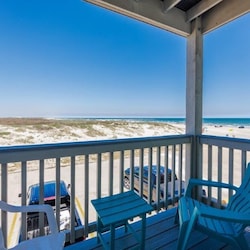 Dune and beach view from primary bedroom balcony