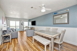 A spacious dining table perfect for enjoying meals with loved ones