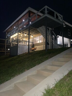 Side view of property , as well as concrete walkway for easy access to river!