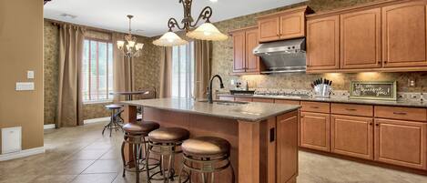 Fully appointed kitchen with open-floor plan.