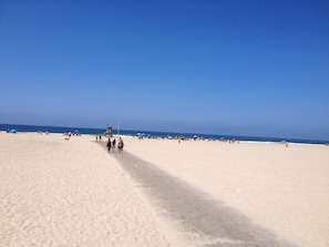 Our neighborhood beach is very wide and less crowed than the pennisula