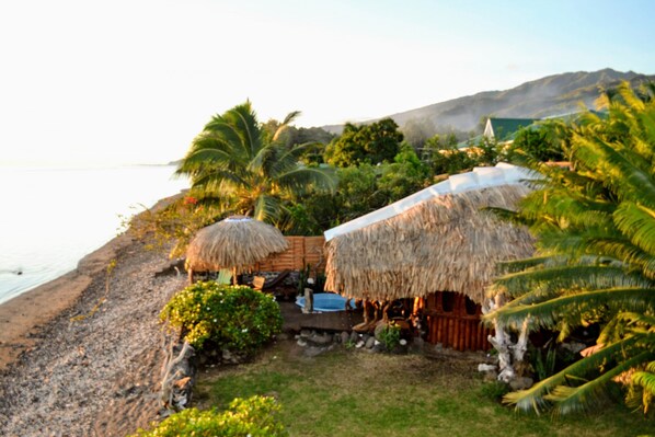 View of the bungalow and the white sandy beach
