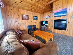 Living room with Smart TV and gas fireplace in the winter months. 