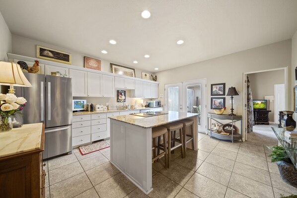 Well appointed kitchen with bar seating