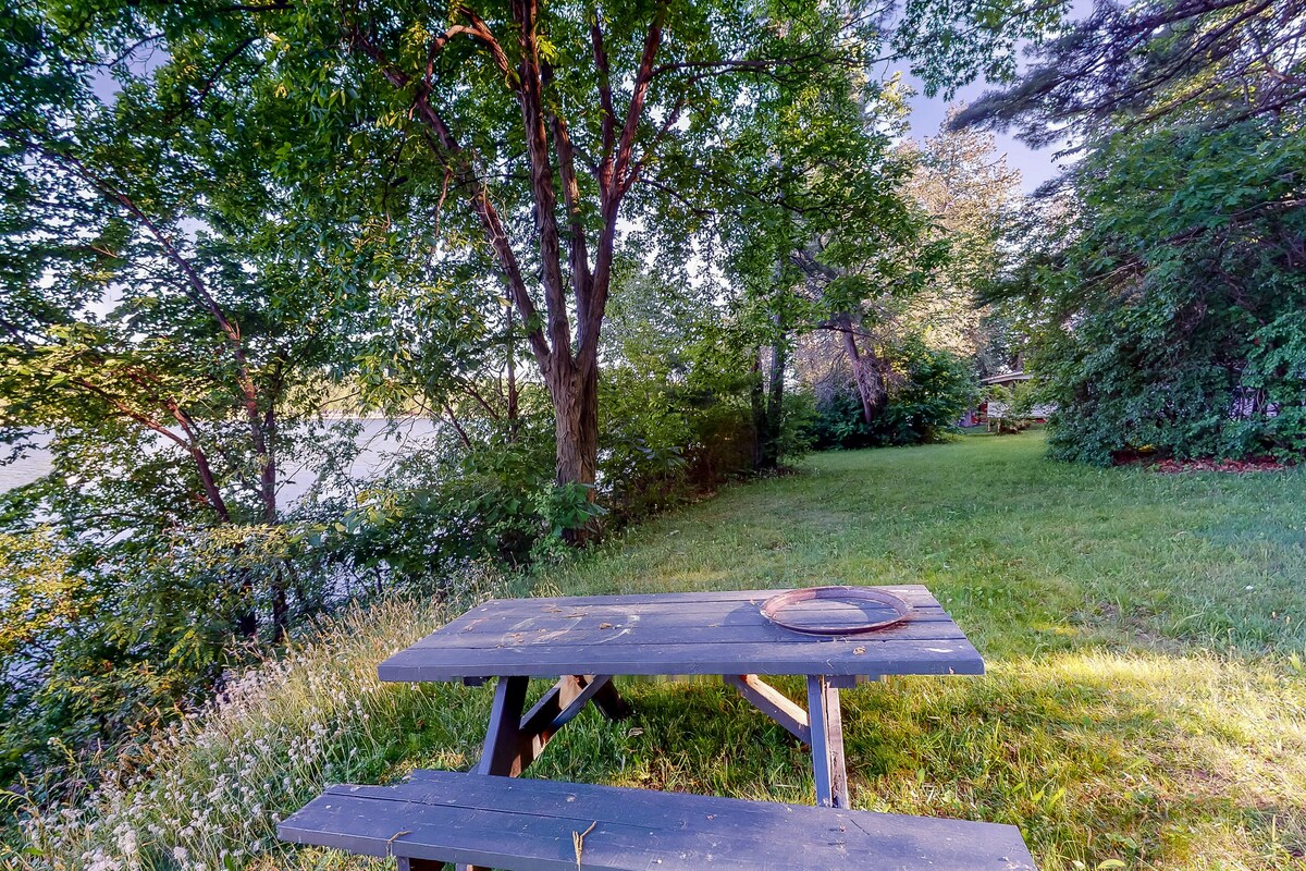 Dog-friendly cabin right on the lake with lots of space, screened porch, & boats
