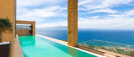 Swim in the exquisite pool of the villa