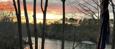 Spacious Sundance hot tub overlooking lake from covered patio!