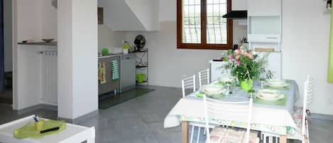 Table, Property, Furniture, Window, Green, Flower, Cabinetry, Interior Design, Floor, Flooring