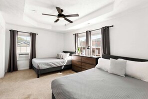 Our home features (3) LARGE Bedrooms. (2) Are upstairs with (2) Queen Beds each and there is (1) Bedroom downstairs with (1) Queen bed. Enjoy a beautiful nights sleep on our memory foam mattresses with luxurious, soft bedding!