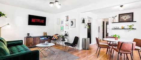 Welcome to Nashville! Experience the city like a local in this beautifully designed Duplex. Featured is the front unit living room dining/living space. Don't forget we have some Netflix for you! Enjoy your stay!