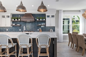 Stunning chef's kitchen with gas range