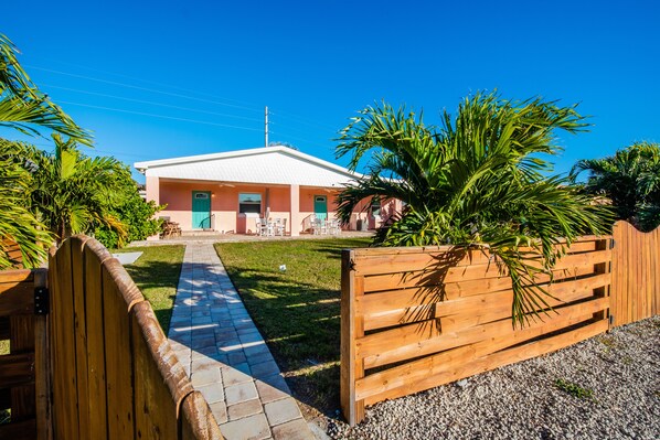 Private Back Yard - The backyard is fenced with 2 showers and 2 entries into the house.