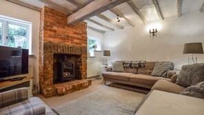 Living room with gas fireplace,  Suncroft, Bolthole Retreats