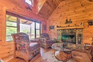 The 3-bedroom, 3-bathroom house features upscale cabin style.