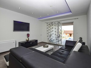 Zimmer, Eigentum, Möbel, Interior Design, Decke, Gebäude, Fussboden, Wohnzimmer, Lila, Wand