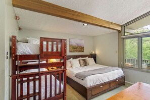 The bedroom area can be closed off for privacy by a wall to wall accordion door.