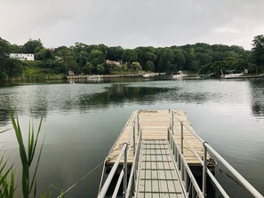 dock on property with swim ladder can hold up to 30 foot boat