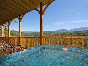 Relax in our hot tub and enjoy the amazing views of the Great Smoky Mountains!